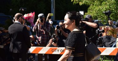 Chinese Huawei tech executive Meng Wanzhou leaves her Vancouver home to appear in British Columbia Supreme Court, May 27,2020. (AFP)