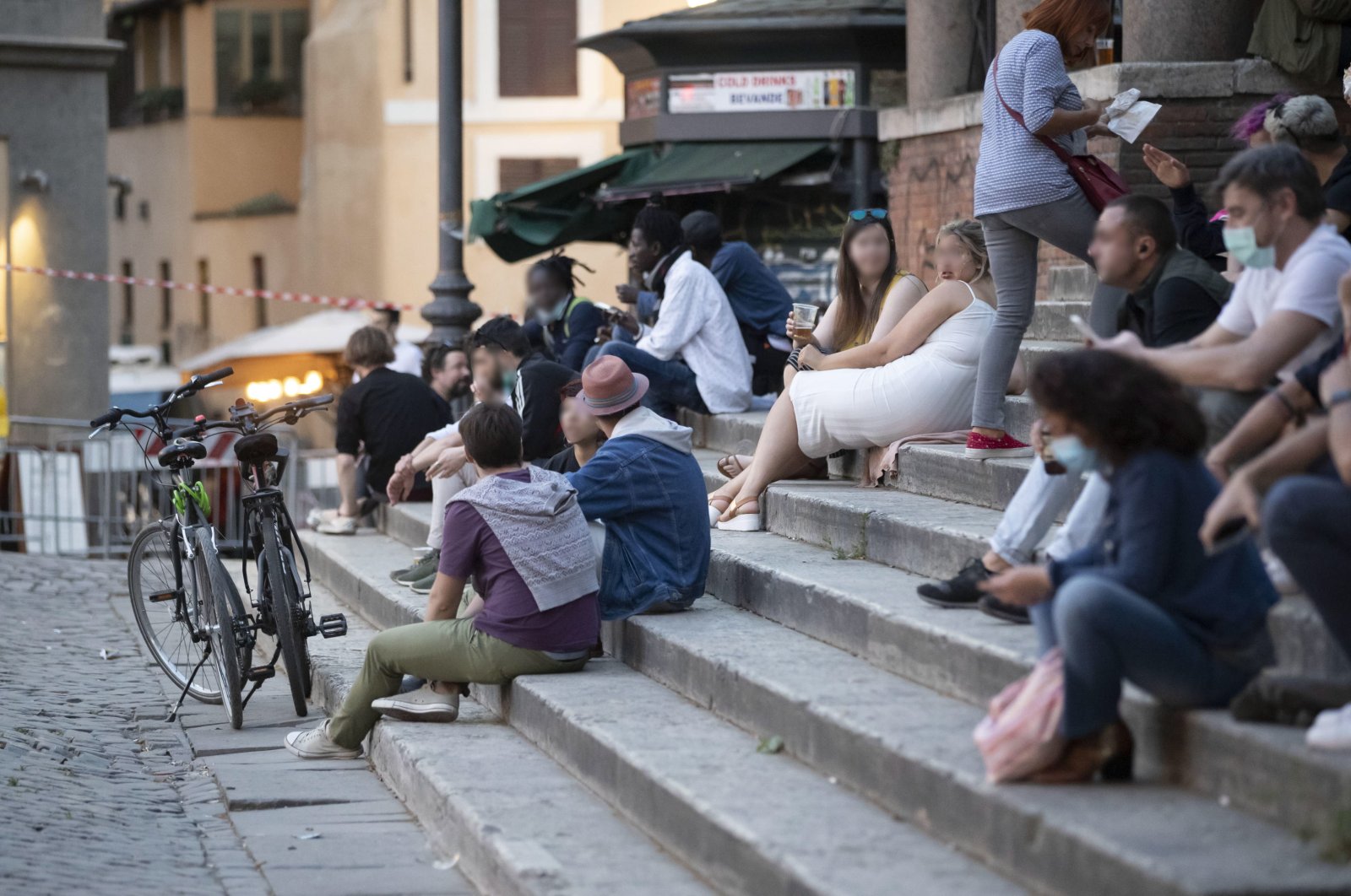 Groups of young people gather at night in bars or cafes to spend the night at Trastevere district in Rome, Italy, 21 May 2020.  