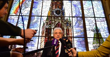 Russian ambassador to Germany Sergey Nechaev (Sergej Netschajew) addressing the media after casting his vote for Russia's presidential elections at the Russian embassy in Berlin, March 18, 2018. (AFP Photo)