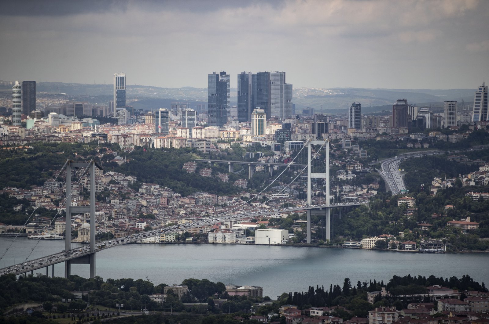 A general view of the July 15 Martyrs Bridge, formerly known as the Bosporus Bridge, and surrounding buildings, Istanbul, Turkey, May 28, 2020. (AA Photo)