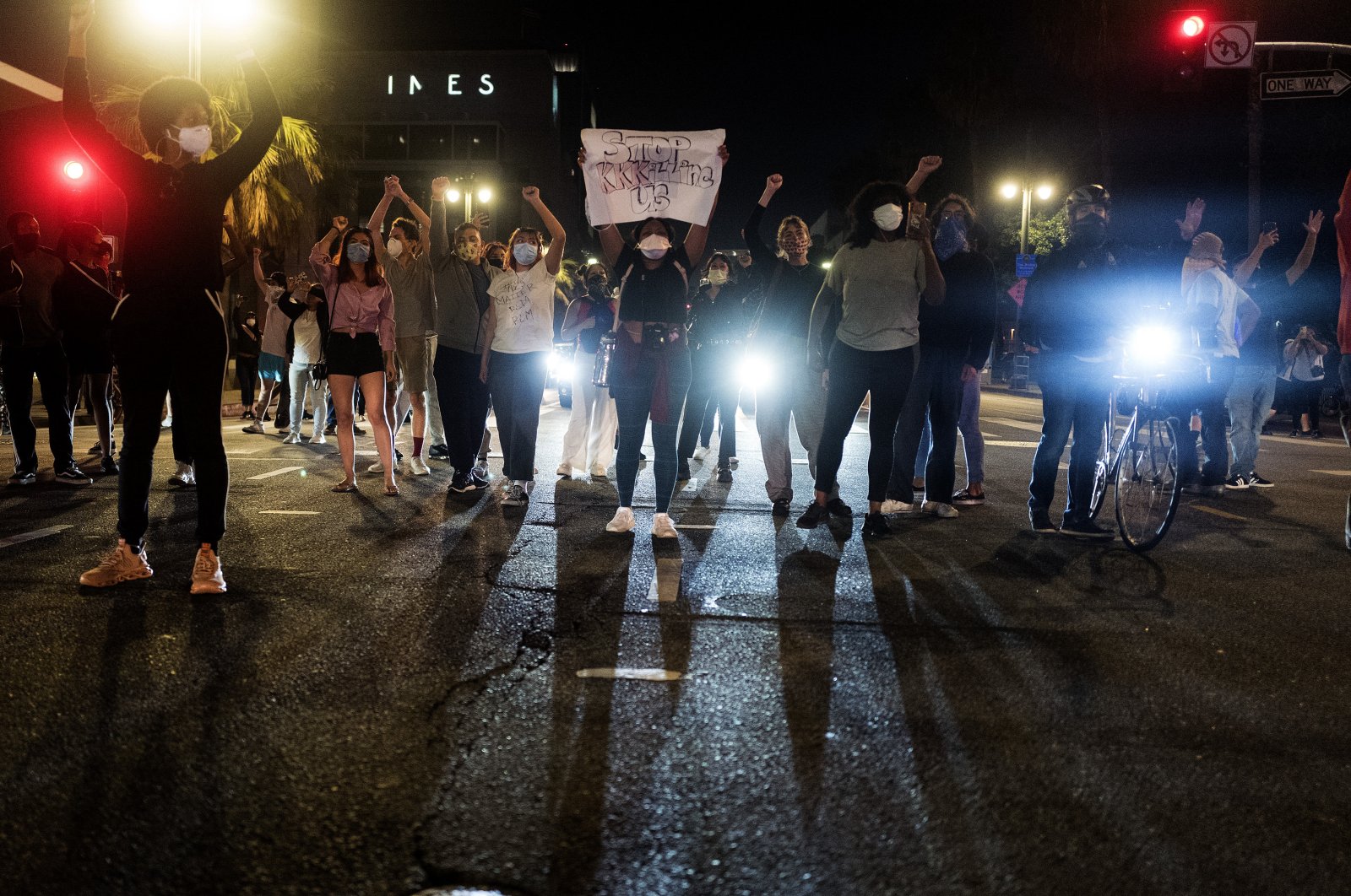 Demonstrators block traffic during a protest over the death of George Floyd in Minneapolis police custody earlier in the week, May 27, 2020, in Los Angeles. (AP Photo)