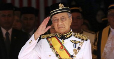 Malaysian ex-Prime Minister Mahathir Mohamad salutes during the opening of the 14th parliament session at the parliament house, Kuala Lumpur, July 17, 2018. (AP Photo)