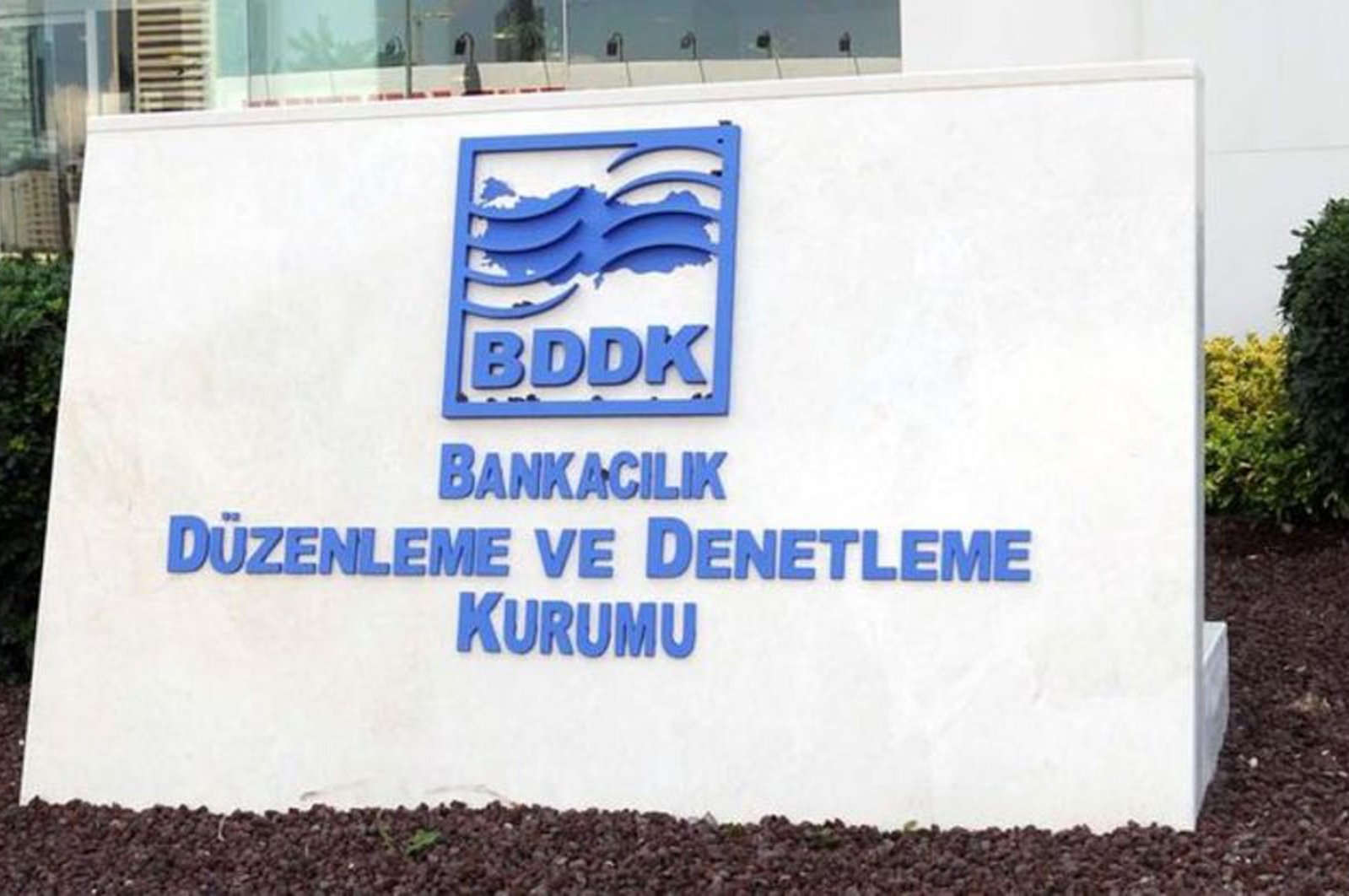 The Banking Regulation and Supervision Agency's (BDDK) logo is seen in front of its Istanbul headquarters.