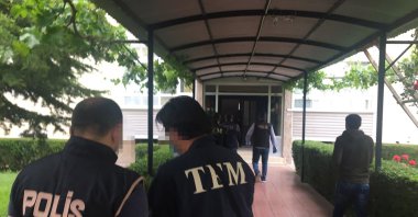 A man suspected of having threatened a Turkish-Armenian foundation was arrested in his Konya home before being immediately taken to Istanbul for questioning, May 30, 2020. (DHA Photo)