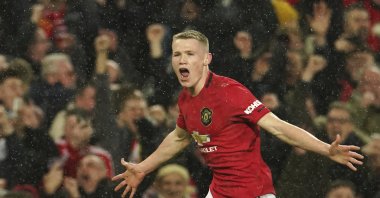 Manchester United's Scott McTominay celebrates a goal during a Premier League match against Manchester City, in Manchester, England, March 8, 2020. (AP Photo)
