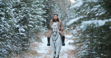 North Korean leader Kim Jong Un rides a horse during snowfall on Paektu Mountain in this image released by North Korea's Korean Central News Agency (KCNA), Oct. 16, 2019. (KCNA via REUTERS)