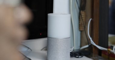 SK Telecom's AI speaker Nugu built with an artificial intelligence called "Aria" and a lamp that turns blue when processing voice commands for news, music and internet searches, is seen at a senior citizen's home in Seoul, South Korea, on May 13, 2020. (AP Photo)