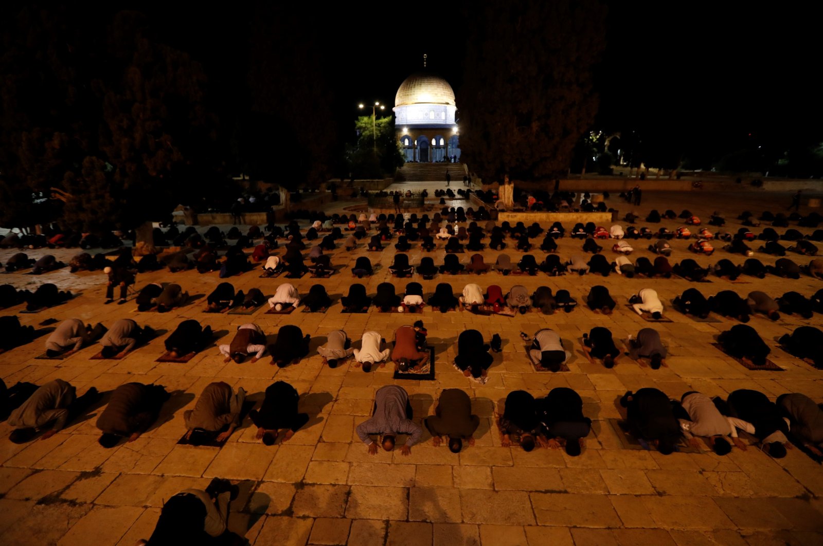 Palestinian worshippers pray at the al-Aqsa mosque compound, Islam's third holiest site, in Jerusalem's Old City on June 1, 2020,  after a two-month closure due to the COVID-19 pandemic. (AFP Photo)