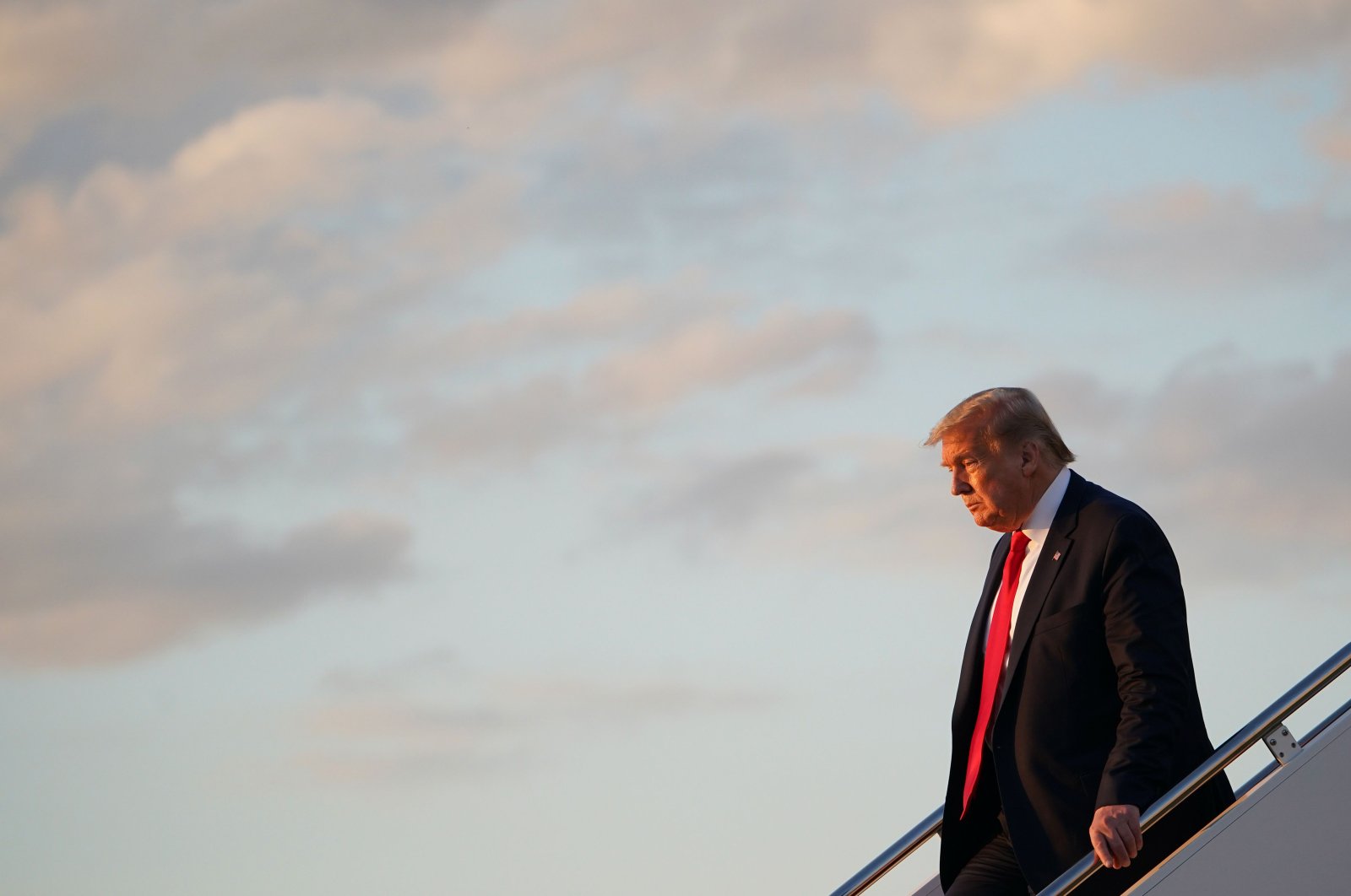 US President Donald Trump steps off Air Force One upon return to Andrews Air Force Base in Maryland on May 30, 2020. (AFP Photo)