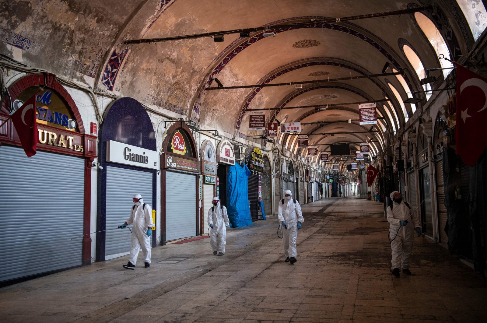 Municipal workers disinfect the iconic Grand Bazaar in Istanbul, Turkey, May 20, 2020. (AFP Photo)