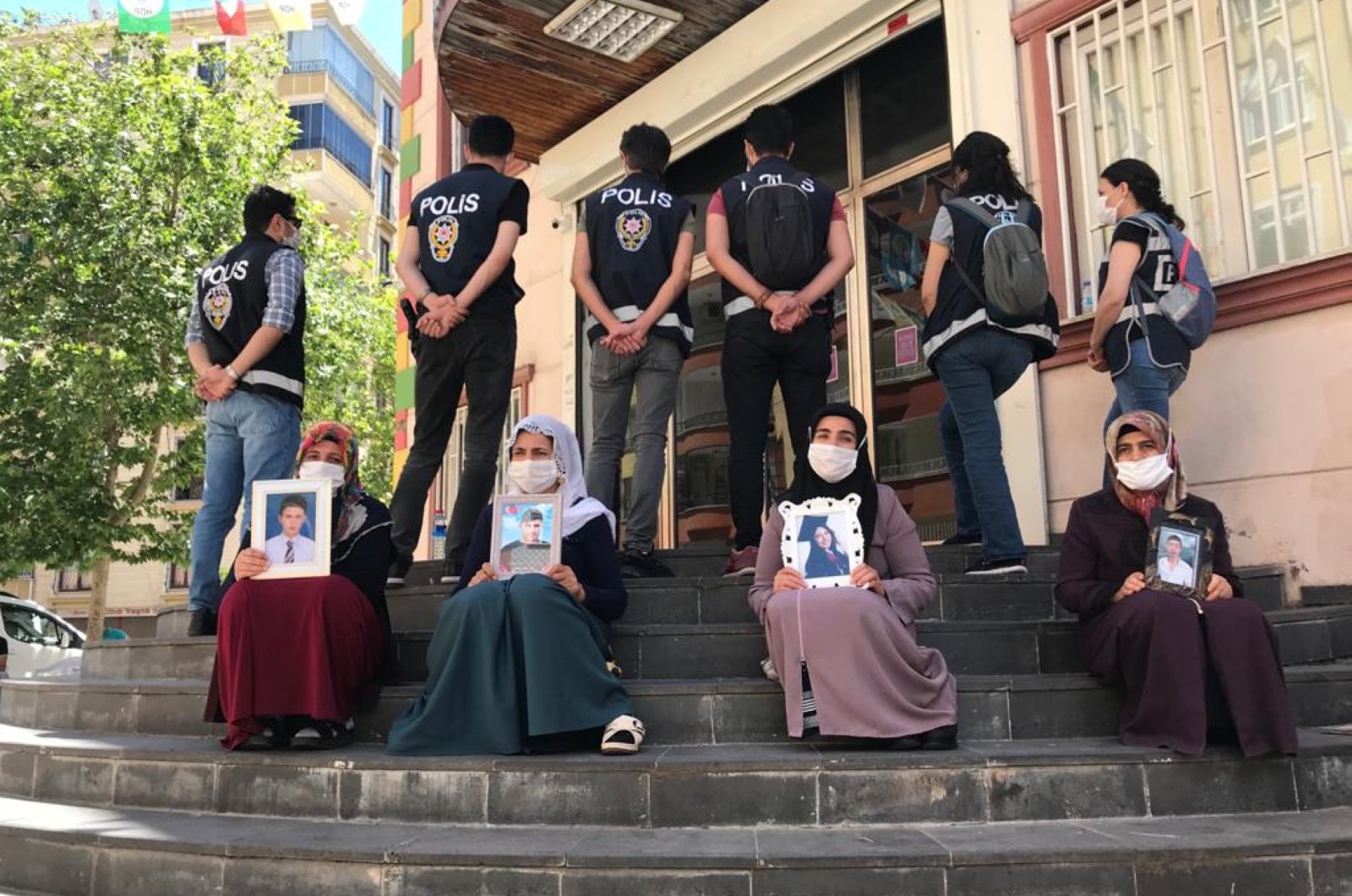 Kurdish mothers staging a sit-in protest in front of the HDP headquarters in Diyarbakır, May 31, 2020. (AA)
