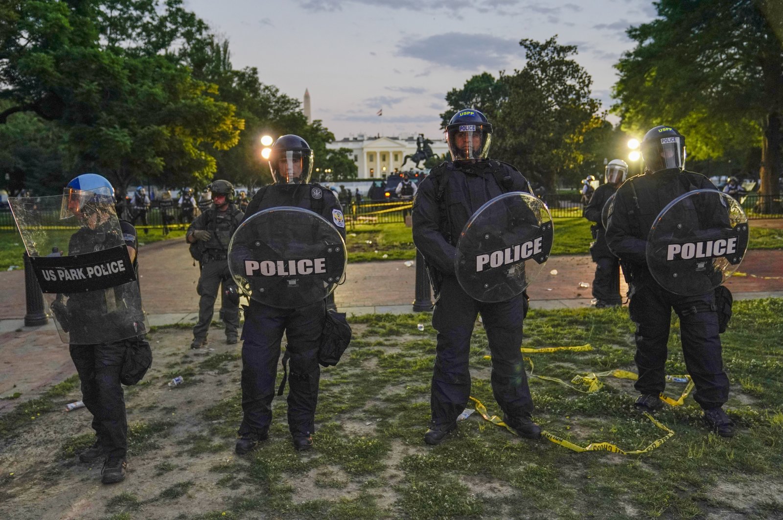 Police in riot gear stand in front of the White House as demonstrators gather to protest the death of George Floyd, Saturday, May 30, 2020, outside the White House in Washington. (AP Photo)