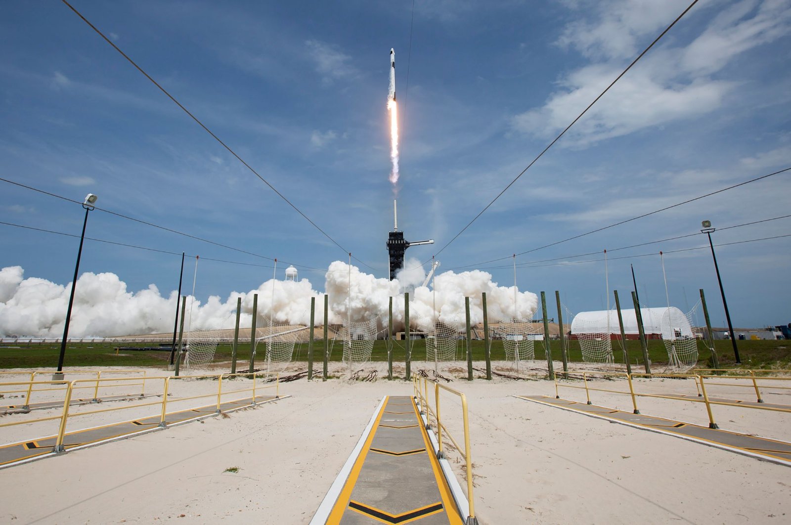 This NASA photo obtained May 31, 2020 shows a SpaceX Falcon 9 rocket carrying the company's Crew Dragon spacecraft launched from Launch Complex 39A on NASA’s SpaceX Demo-2 mission to the International Space Station with NASA astronauts Robert Behnken and Douglas Hurley onboard, at 3:22 p.m. EDT on May 30, 2020, at NASA’s Kennedy Space Center in Florida. (AFP Photo)