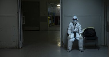 A medic sits in an intensive care unit of Filatov City Clinical Hospital in Moscow, Russia, May 15, 2020  (AP Photo)