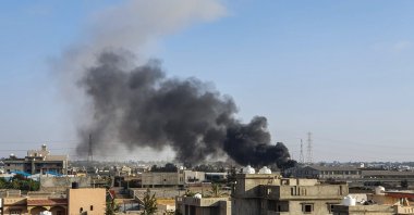 Smoke plumes rise following a reported airstrike by forces loyal to putschist Gen. Khalifa Haftar in Tajoura, south of the capital Tripoli, Libya, June 29, 2019. (AFP File Photo)