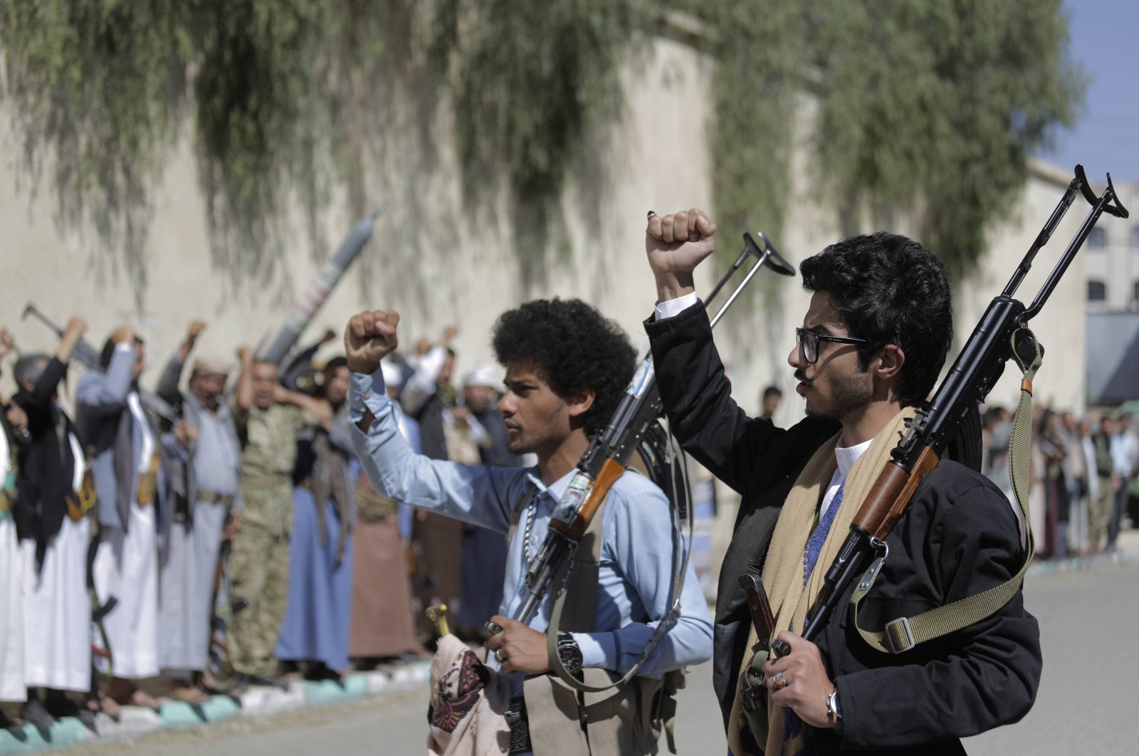 Tribesmen loyal to the Houthi rebels chant slogans during a gathering aimed at mobilizing more fighters for the Houthi movement in Sanaa, Yemen, Feb. 25, 2020. (AP Photo)