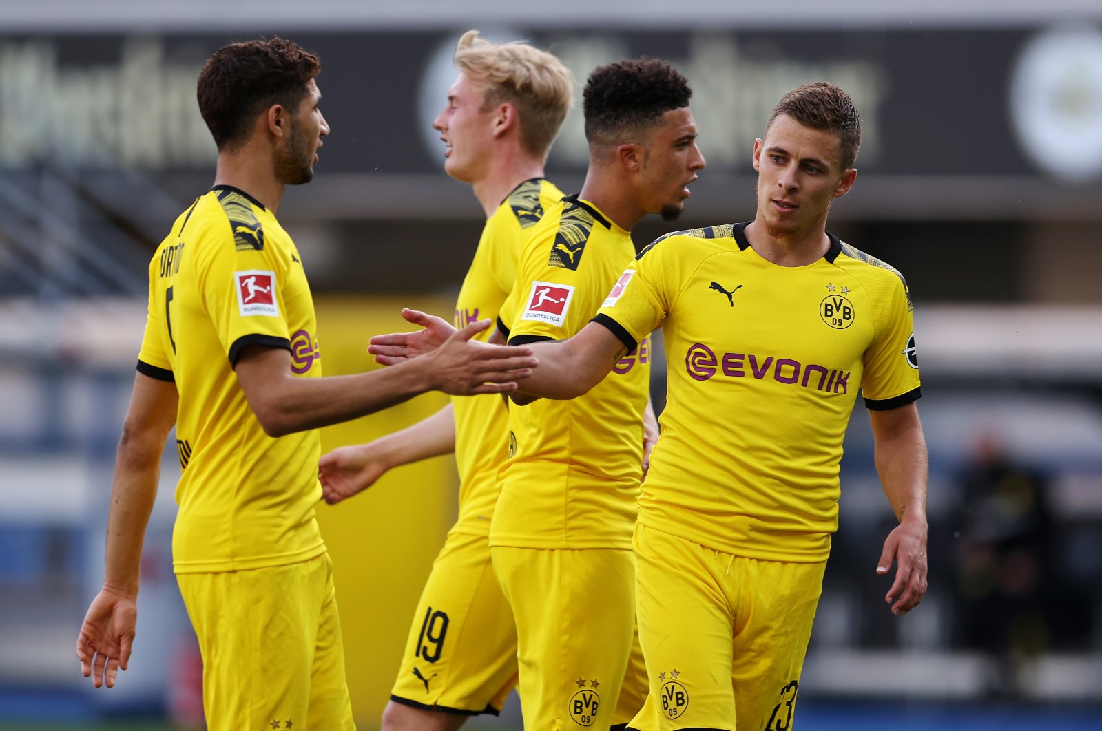 Thorgan Hazard (R) of Borussia Dortmund celebrates with teammates, scoring the 1-0 lead during a match against SC Paderborn 07, Paderborn, Germany, May 31, 2020. (EPA Photo)