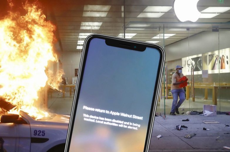 A looter leaves the Apple Store as a police car burns during the Justice for George Floyd Philadelphia Protest in Philadelphia, May 30, 2020. (AP Photo)