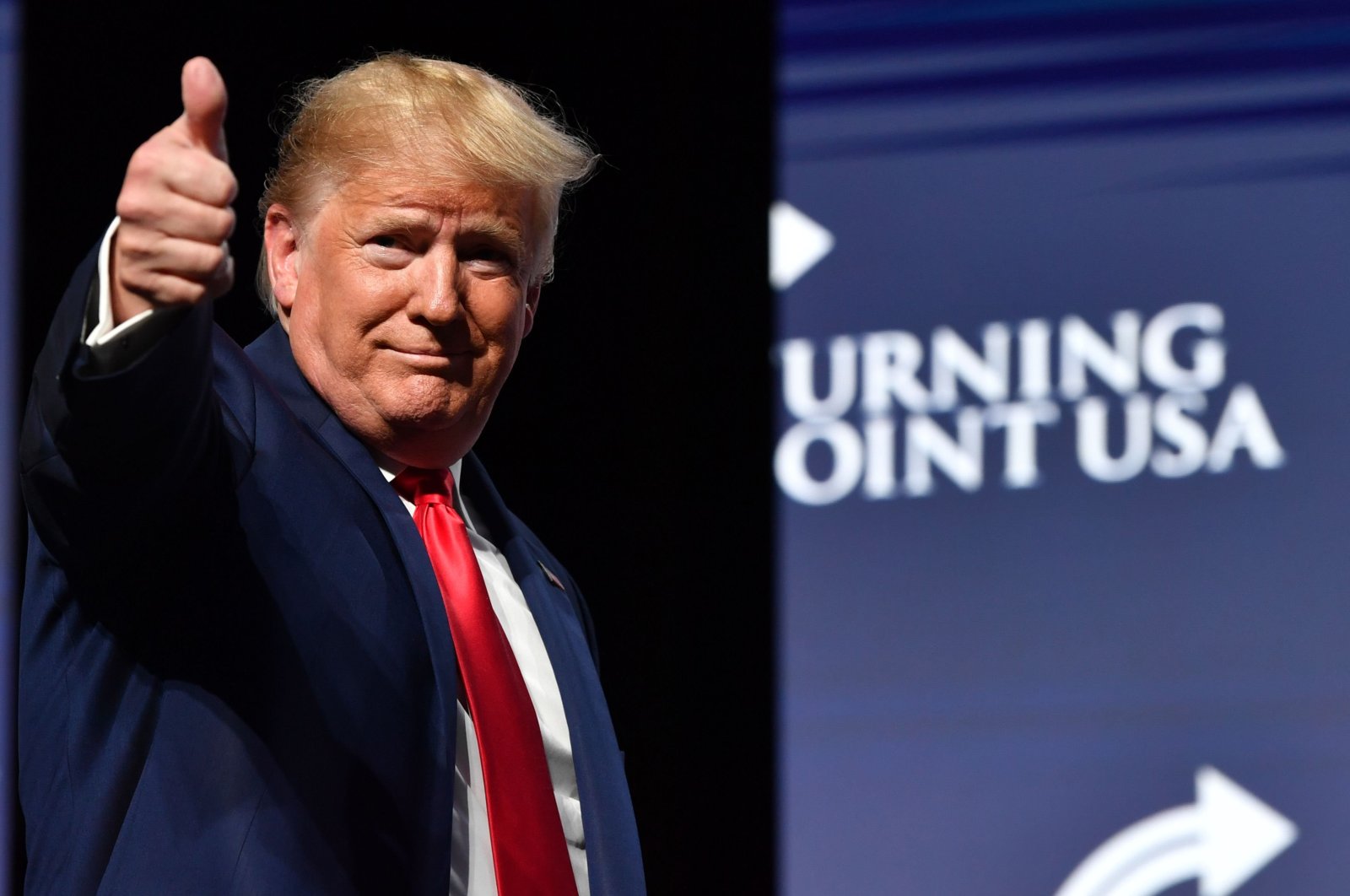 U.S. President Donald Trump gestures during the Turning Point USA Student Action Summit at the Palm Beach County Convention Center in West Palm Beach, Florida, U.S., Dec. 21, 2019. (AFP Photo)