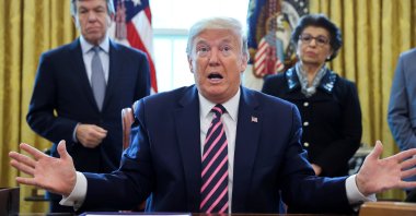 U.S. President Donald Trump speaks to reporters during a signing ceremony for the "Paycheck Protection Program and Health Care Enhancement Act," approving additional COVID-19 relief for the U.S. economy and hospitals treating people sickened by the pandemic, in the Oval Office at the White House in Washington, U.S., April 24, 2020. (Reuters Photo)