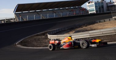 F1 driver Max Verstappen drives his car through one of the two banked corners during a test and official presentation of the renovated F1 track in Zandvoort, Netherlands, March 4, 2020. (AP Photo)