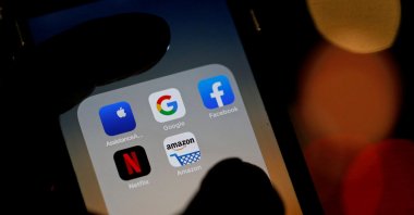 The logos of mobile apps Google, Amazon, Facebook, Apple and Netflix are displayed on a screen in this illustration picture taken Dec. 3, 2019. (Reuters Photo)
