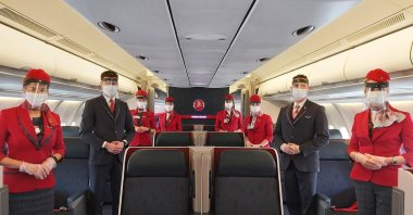 Hygiene experts monitor passengers for compliance with hygiene rules and disinfect every spot they may have touched. (IHA Photo) 