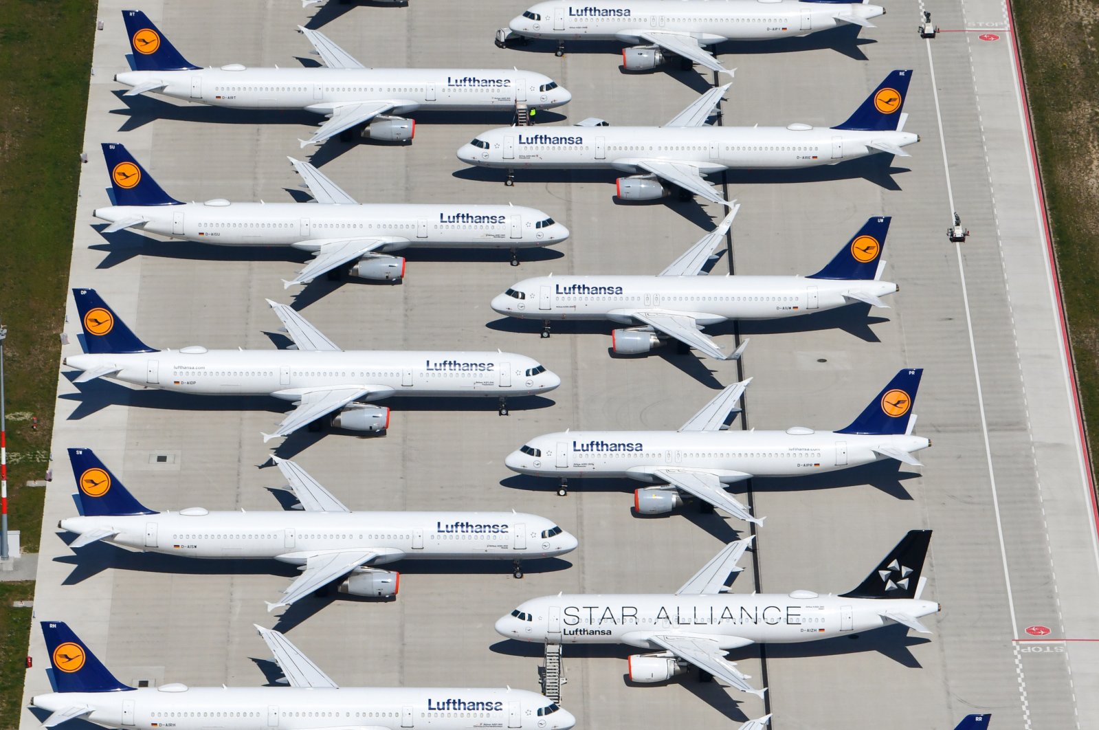 An aerial view shows aircraft of Lufthansa sitting on the tarmac at the Berlin Brandenburg International Airport in Schoenefeld, Germany, April 23, 2020. (EPA Photo)