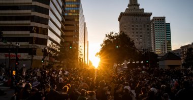 Demonstrators attend a protest against the killing of George Floyd, along a street in downtown Oakland, California, U.S., June 3, 2020. (AFP Photo)