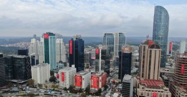 Skyscrapers in the Istanbul's Maslak business and financial district are decorated with the Turkish flag marking Republic Day, Oct. 29, 2019. (DHA Photo)