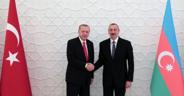 President Recep Tayyip Erdoğan shakes hand with Azeri President Ilham Aliyev, Baku, Nov. 15, 2019. (AA)