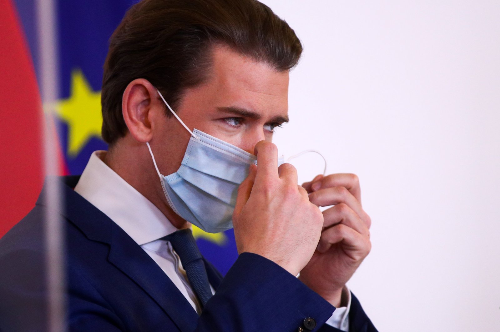 Austrian Chancellor Sebastian Kurz removes his face mask as he attends a news conference during the coronavirus outbreak in Vienna, Austria, May 29, 2020. (Reuters Photo)