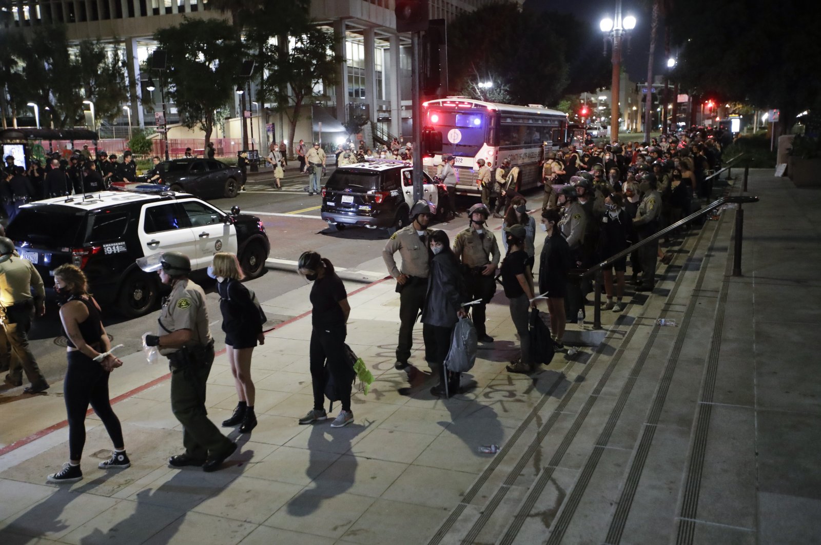 Demonstrators are arrested for a curfew violation, Los Angeles, California, U.S., June 3, 2020. (AP Photo)
