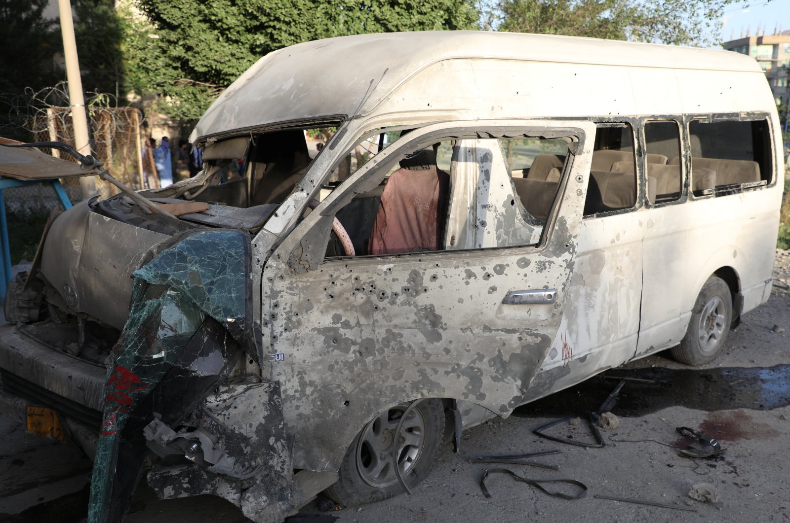 A wreckage of a bus which carried employees of an Afghan television station and was bombed is seen in Kabul, Afghanistan May 30, 2020. (Reuters Photo)