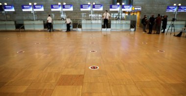 A social distancing marker is seen on the floor at the departures terminal at Ben Gurion Airport, in Lod, near Tel Aviv, Israel, May 14, 2020. (Reuters Photo)