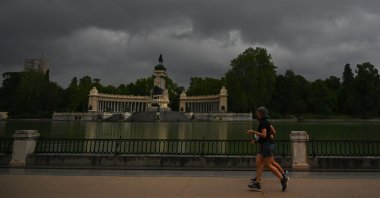 People run at the Retiro park in Madrid, June 4, 2020 in Madrid. (AFP Photo)