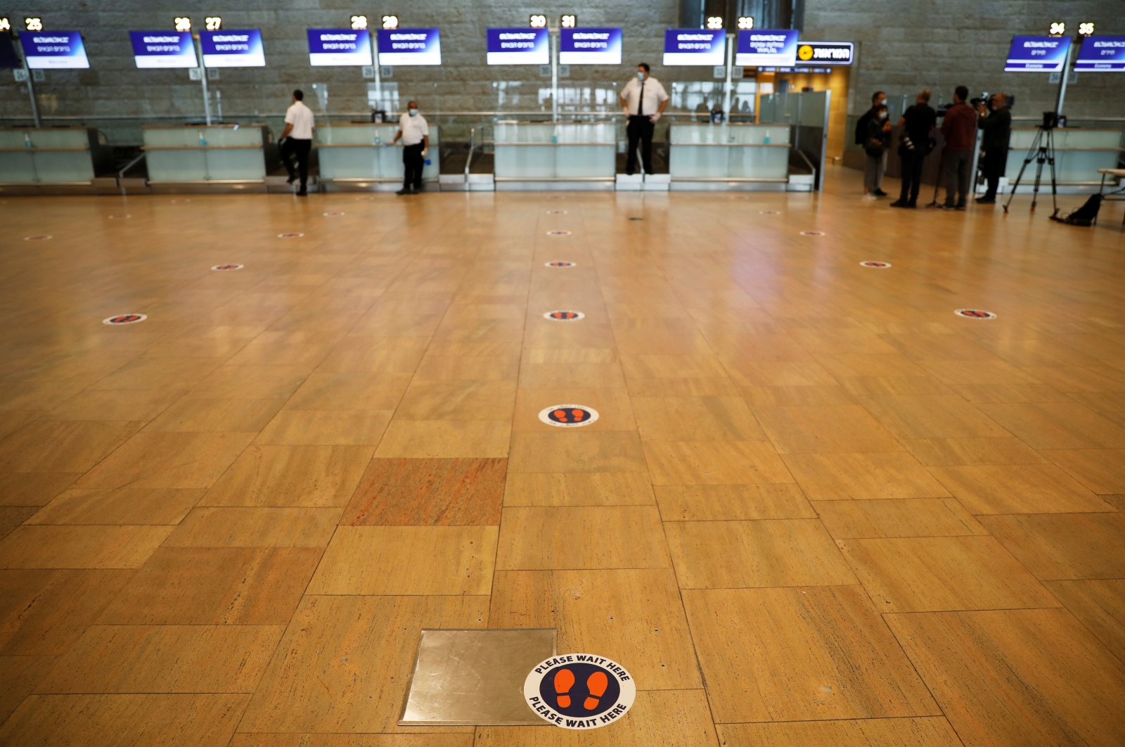 A social distancing marker is seen on the floor at the departures terminal at Ben Gurion Airport, in Lod, near Tel Aviv, Israel, May 14, 2020. (Reuters Photo)