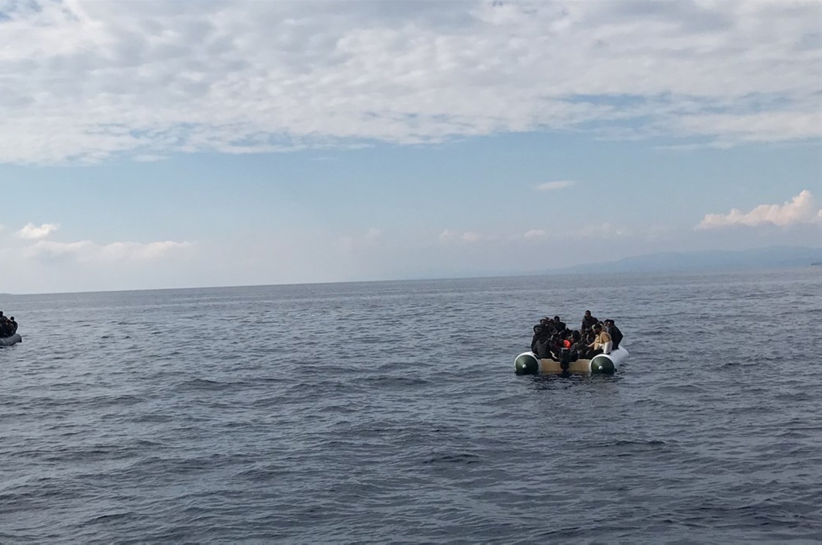 Turkish Coast Guard Command rescues 85 migrants and refugees off Çanakkale province's Aegean coast, June 4, 2020. (AA Photo)