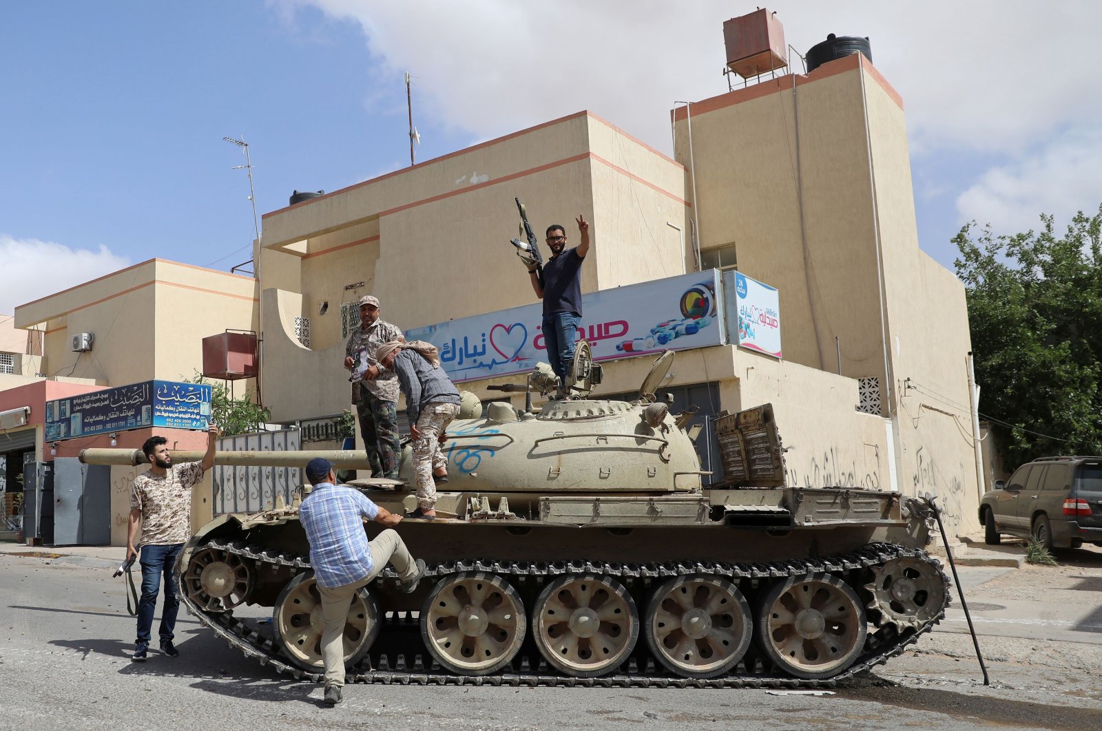 Fighters loyal to Libya's internationally recognized government celebrate after regaining control over Tarhuna city, Libya, June 5, 2020. (Reuters Photo)