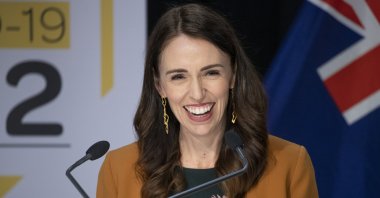 New Zealand Prime Minister Jacinda Ardern smiles as she addresses a press conference where she announced New Zealand will drop to COVID-19 alert level 1 at midnight in Wellington, New Zealand, Monday, June 8, 2020 (Mark Mitchell/New Zealand Herald via AP)