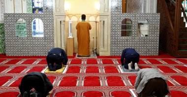 Muslims pray amid social distancing markers at the Grand Mosque, after weeks of lockdown restrictions following the coronavirus outbreak, Brussels, Belgium, June 8, 2020. (Reuters Photo)