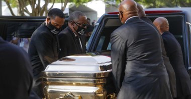 George Floyd's casket is loaded into a hearse after being brought out of The Fountain of Praise church following a public visitation, in Houston, Texas, U.S., June 8, 2020. (EPA-EFE Photo)