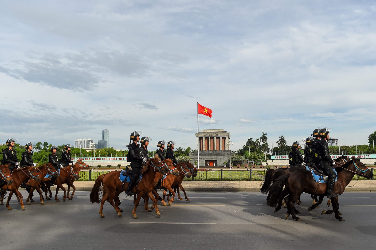 Mounted police personnel parade on horses past the Ho Chi Minh mausoleum in Hanoi, Vietnam, June 8, 2020. (AFP Photo)