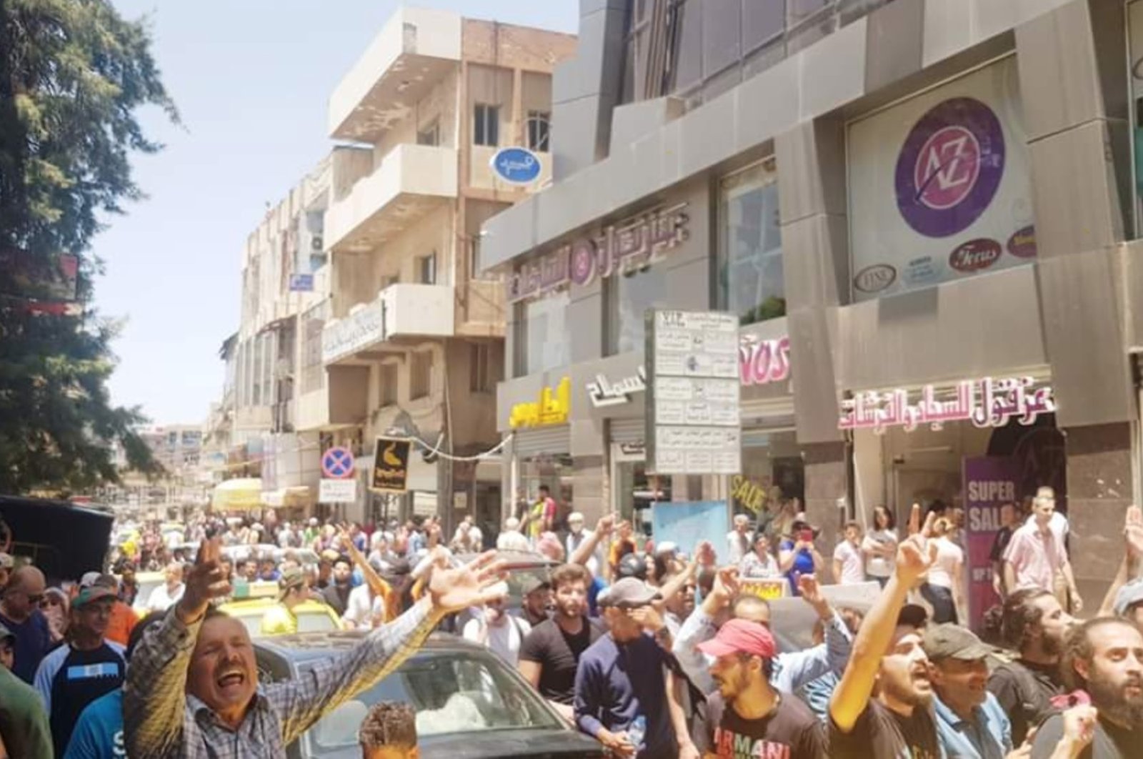 This photo taken from Twitter shows citizens protesting against the Assad regime in Syria's Sweida, May 8, 2020