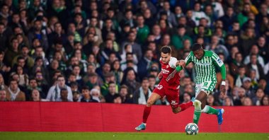 Real Betis' Emerson competes for the ball with Sevilla's Sergio Reguilon Rodriguez during a La Liga match in Seville, Spain, Nov. 10, 2019. (Photo by Quality Sport Images/Getty Images)

