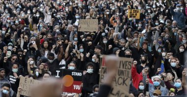 Protesters gather in Sydney, Saturday, June 6, 2020, to support the cause of U.S. protests over the death of George Floyd. (AP Photo)