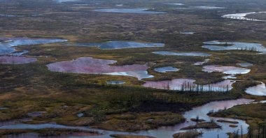An aerial view shows the pollution in a river outside Norilsk, June 6, 2020. (AFP Photo)