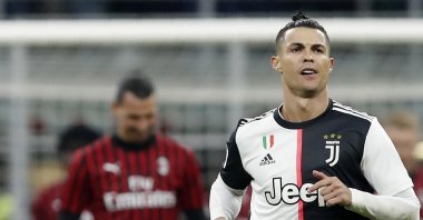Juventus' Cristiano Ronaldo celebrates after scoring a penalty against AC Milan during an Italian Cup match in Milan, Italy, Feb. 13, 2020. (AP Photo)