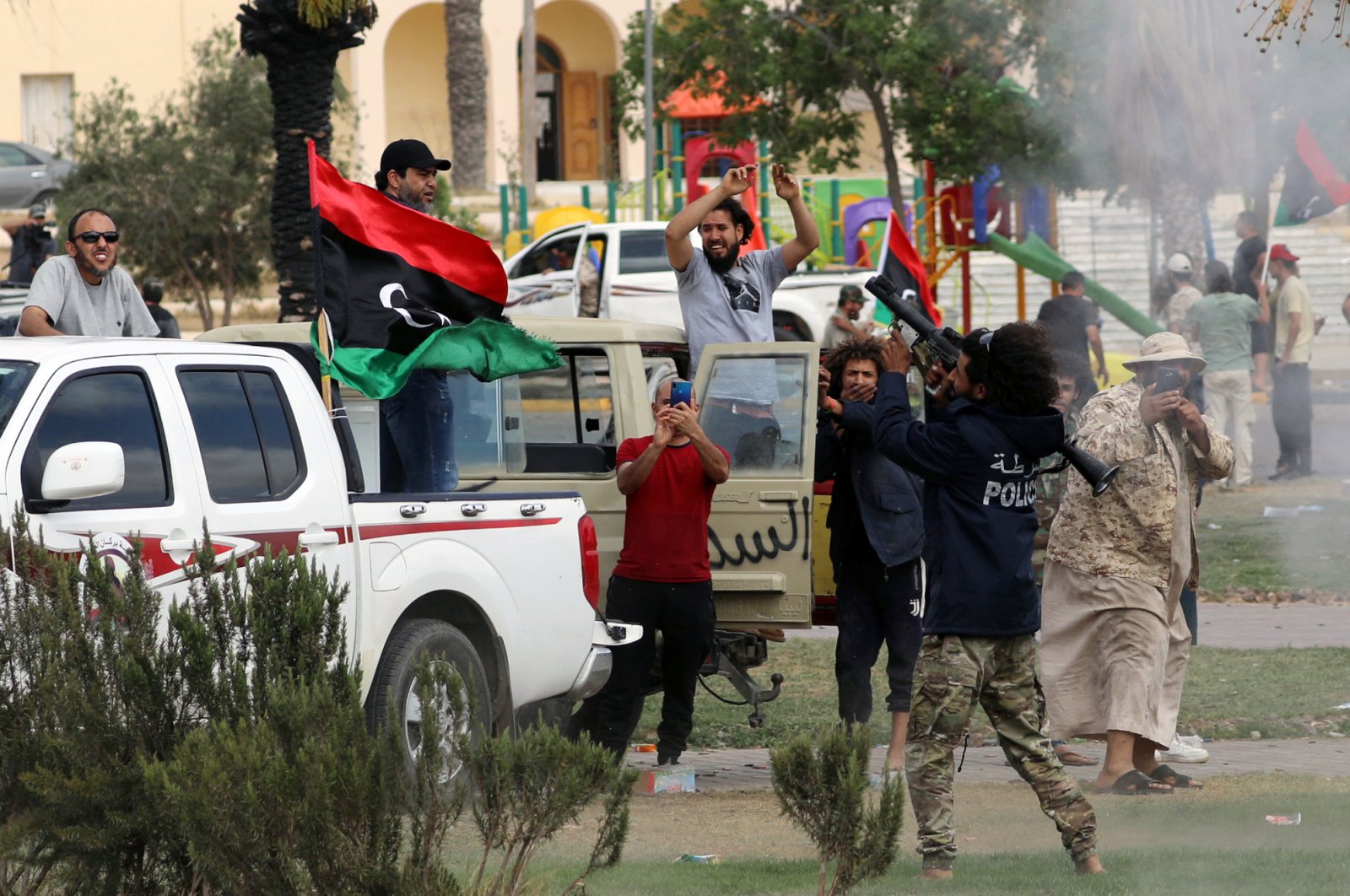 Fighters loyal to Libya's internationally recognized government celebrate after regaining control of Tarhuna city, Libya, June 5, 2020. (REUTERS Photo)