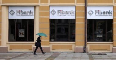 A man walks in front of an office of the First Investment Bank (Fibank) in Sofia, Bulgaria, June 12, 2020. (Reuters Photo)